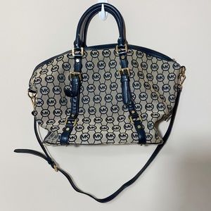 Michael Kors black purse with gold accents